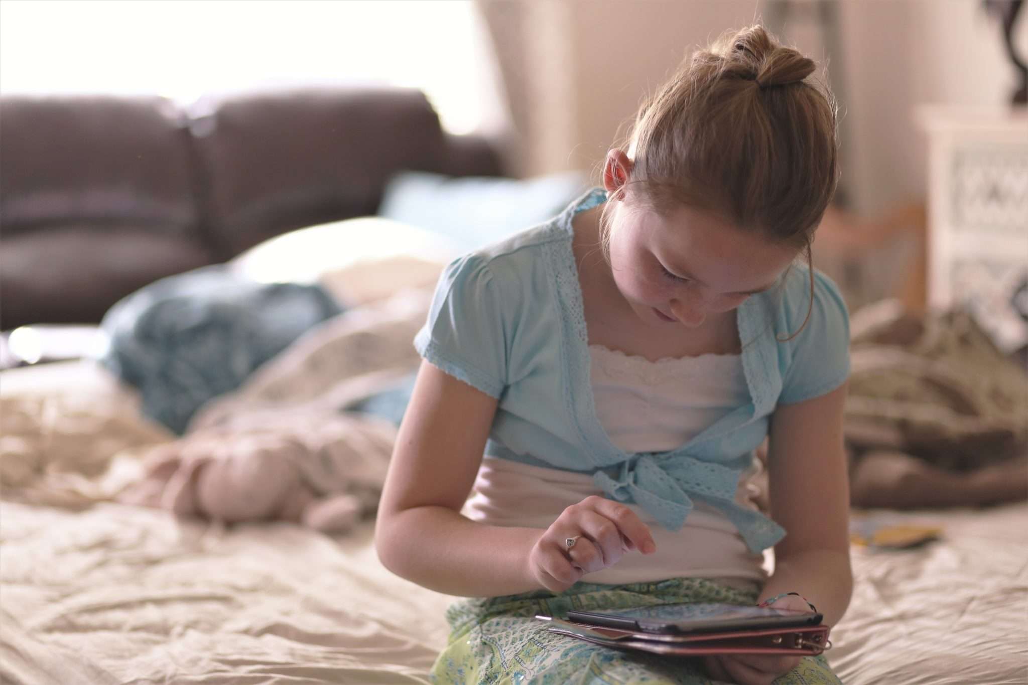 Little girl having screen time