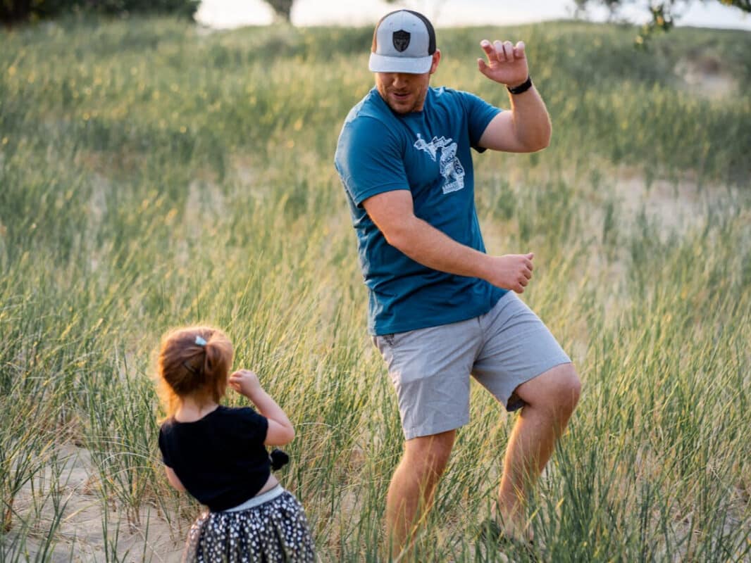 Parenting 101: dad dancing with child