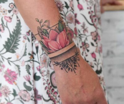 Wrist coloured flower tattoo