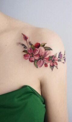 Cherry blossom coloured flower tattoos