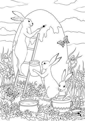 Three easter bunnies painting a huge easter egg